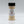 Spice jar labeled 'Casa Flake' on a gray background