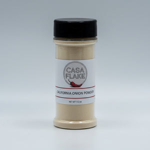 Spice container labeled 'Casa Flake' on a gray background
