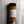 A 4 oz clear plastic spice jar of Casa Flake Chili Lime Seasoning with a black lid and white label, set against a gray marble background.