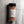 A 7 oz clear plastic shaker bottle of Casa Flake Himalayan Pink Salt with a black lid and white label, set against a gray marble background.