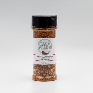 Jar of Casa Flake Aleppo Pepper on a gray background