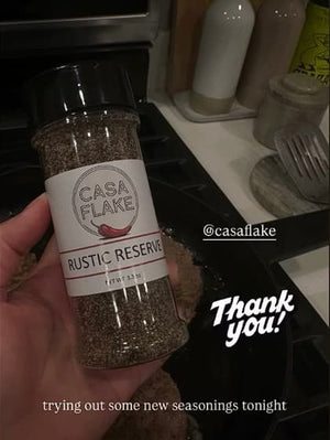 Casa Flake Rustic Reserve bottle held by hand