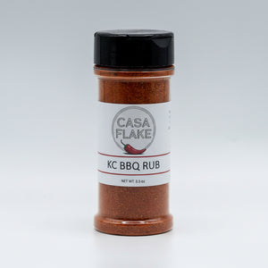 Bottle of Casa Flake KC BBQ Rub on a gray background