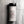 A clear plastic shaker bottle of Casa Flake Kosher Salt with a black flip-top lid and a white label, set against a gray marble-textured background.