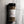 A 3 oz clear plastic spice jar of Casa Flake Lemon Pepper with a black lid and white label, set against a gray marble background.