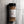 A 5 oz clear plastic spice jar of Casa Flake Salted Caramel Seasoning with a black lid and white label, set against a gray marble background.
