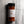 A bottle of Casa Flake Smoked Sweet Paprika seasoning with a black cap and white label, set against a gray marble background.