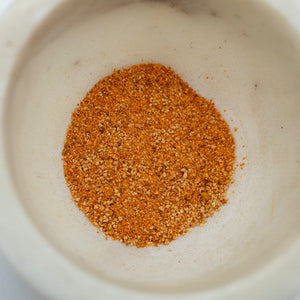 Spice mix in a white bowl