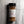 A 5 oz clear plastic spice jar of Casa Flake Sweet Cinnamon Blend with a black lid and white label, set against a gray marble background.