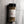 A clear plastic bottle of Casa Flake Tuscany Bread Dipping Seasoning with a black lid and white label, set against a gray marble background.