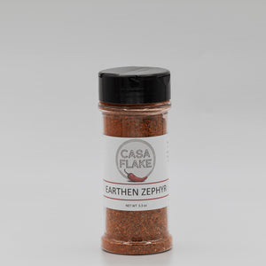 Spice jar labeled 'Casa Flake Earthen Zephyr' on a gray background
