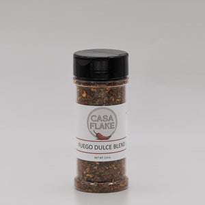 Spice jar labeled 'Casa Flake Fuego Dulce Blend' on a gray background