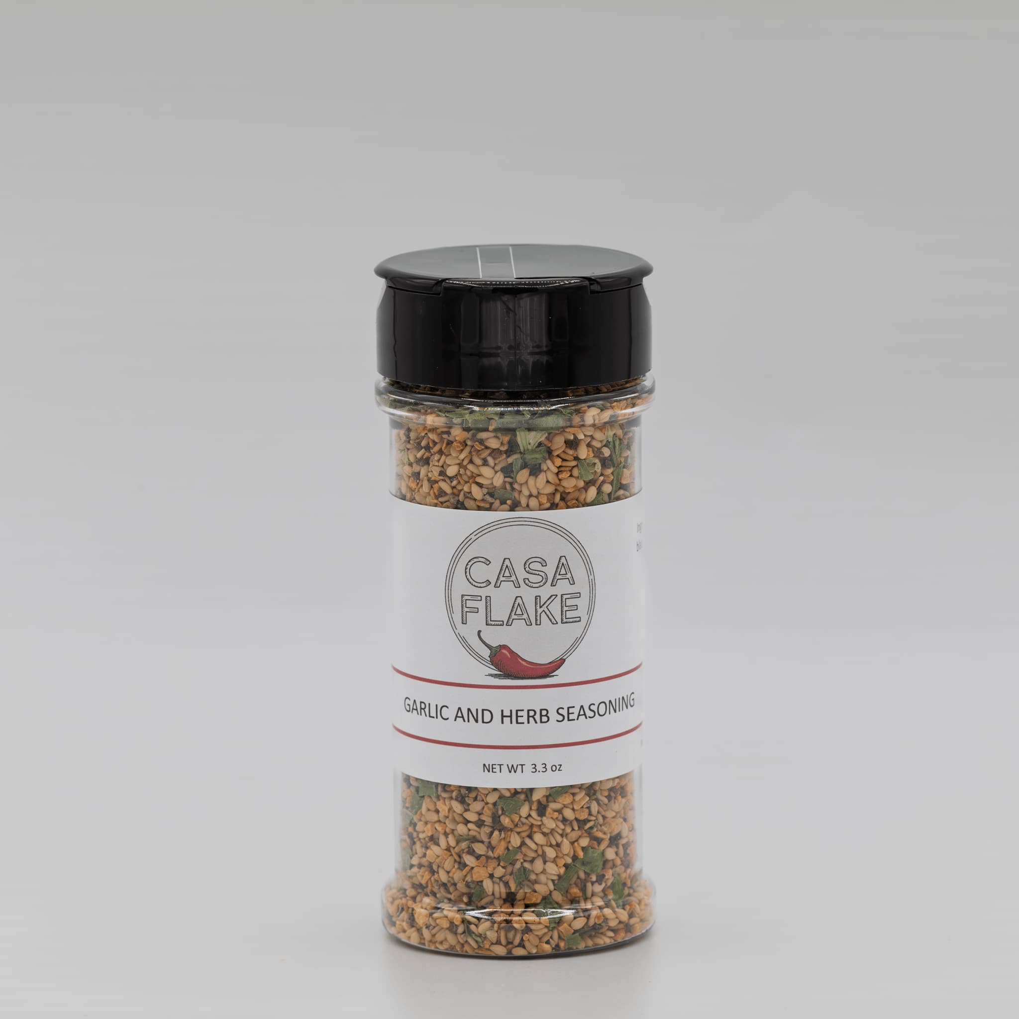 Spice jar labeled 'Casa Flake' on a gray background