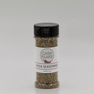Bottle of Casa Flake Pizza Seasoning on a gray background