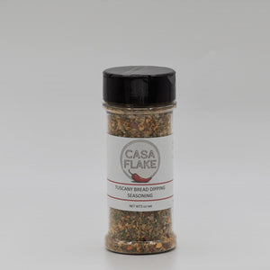 Jar of Casa Flake Tuscan Bread Dipping Seasoning on a gray background